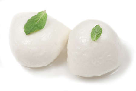 Ñheese Italian Mozzarella in balls isolated ove white backgroundの写真素材