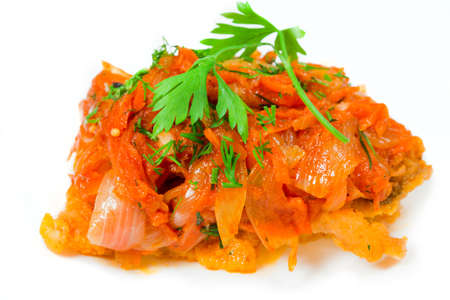  Roasted fish in tomato marinade with carrots isolated over whiteの写真素材