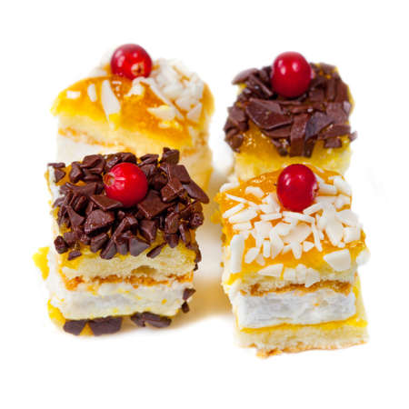 Tasty cakes isolated on a white backgroundの写真素材