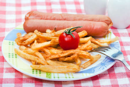 Food - plate with snack - potatoes and frankfurter on a tableの写真素材