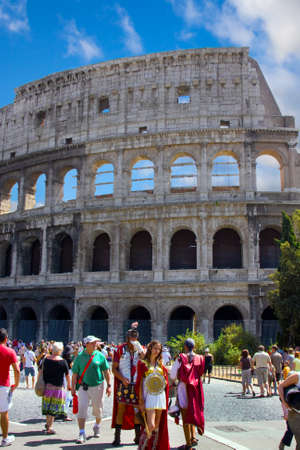  Italy, Rome, August, 26th, 2008: Cityscape of Rome with tourists, Roman  Amphitheatre Colosseum,...