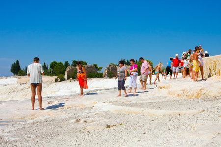 Travertine pools and terraces, tourists in Pamukkale, Turkey - September 3, 2009のeditorial素材