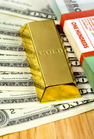 The money dollars and euro and gold bullionの写真素材