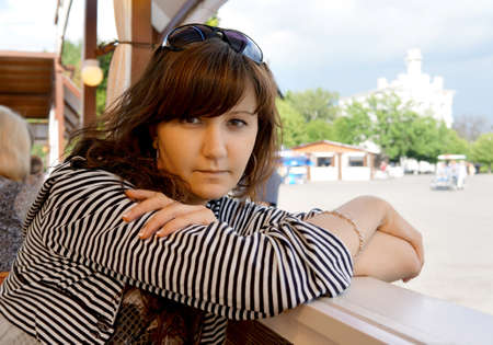 Portrait of the beautiful girl in a park in Moscowl cityの写真素材