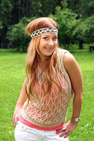 Portrait of the beautiful girl in a park in Moscow  cityの写真素材