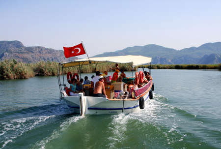 Dalyan river and people - tourists on boats, Turkey のeditorial素材