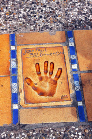 CANNES, FRANCE - June 13  Print of a palm of a hand of the known actor of cinema Jean Paul Belmondo, located on the famous  La Croisette  Boulevard in Cannes, French Riviera, France, Europe; June 13, 2010のeditorial素材