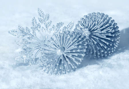 Christmas decorations on a snow background of nature