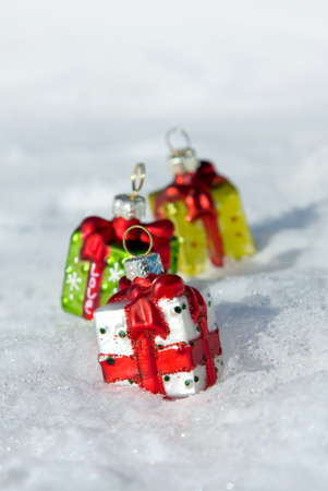 Christmas decorations on a snow background of natureの写真素材