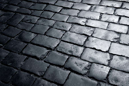 Cobbly way, road covered with stonesの写真素材