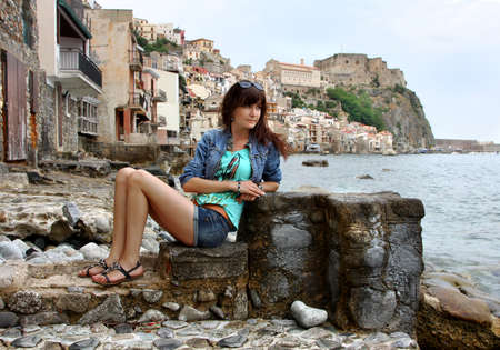 Happy young woman on holidays on the seaの写真素材