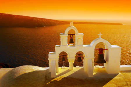 Beautiful sunset in Oia village in Santorini island  Greeceの写真素材