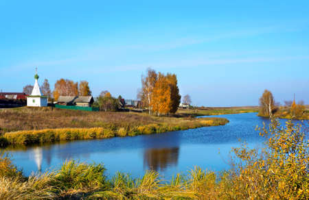 Autumn season in Kostroma city,  chapel on riverの写真素材