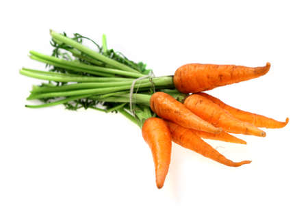 Food  ingredients - vegetable carrot isolated over white backgroundの写真素材