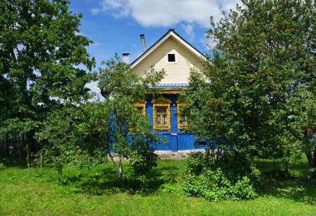 Summer nature, scenery. Old wooden country house