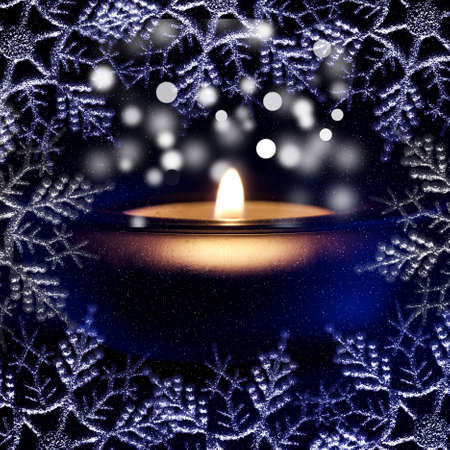 Christmas light, candle and frosty patternの写真素材