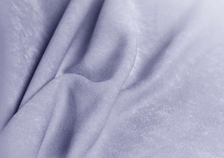 Grey velvet background with folds for designの写真素材