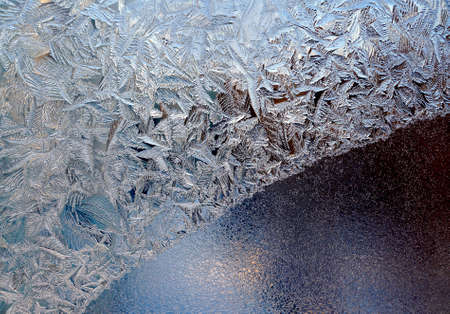 Frosty natural pattern at a winter window
