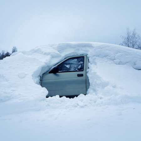 Car in snowdriftの写真素材