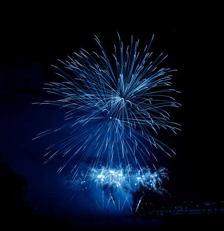 Blue  firework in a night sky