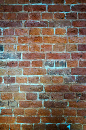 Old wall of red bricks, vertical  backgroundの写真素材