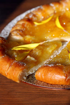 Fresh baked traditional pie with orange confitureの写真素材