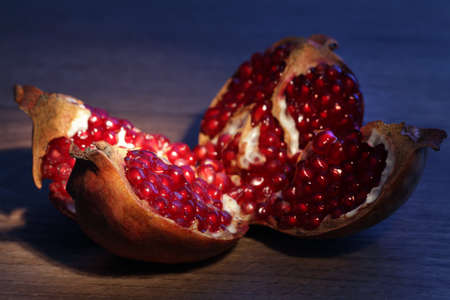 Fruit freshed pomegranate on wooden backgroundの写真素材