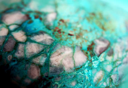 Natural gemstone Israeli turquoise - chrysocolla close-up, beautiful texture of gemstoneの写真素材