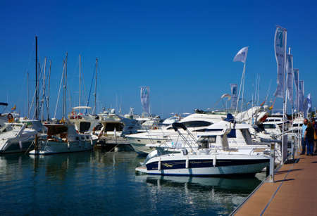 Cambrils, Spain - may 16, 2016: View of port and city waterfront , yahts and boatsのeditorial素材