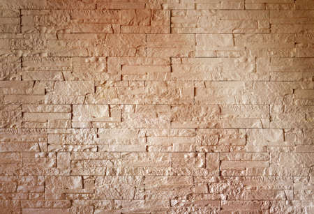 Modern wall of  plaster bricks, natural texture background