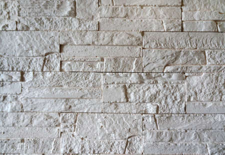 Wall of  plaster bricks, natural texture background
