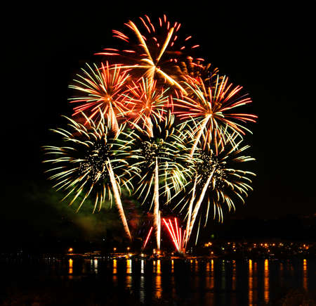 Celebratory bright firework in a night skyの写真素材