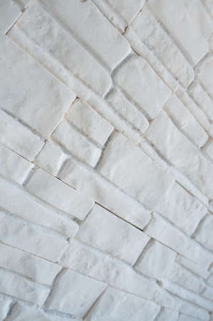 Modern white wall of  bricks, a natural texture backgroundの写真素材