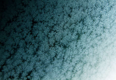 Frosty natural pattern at a winter window