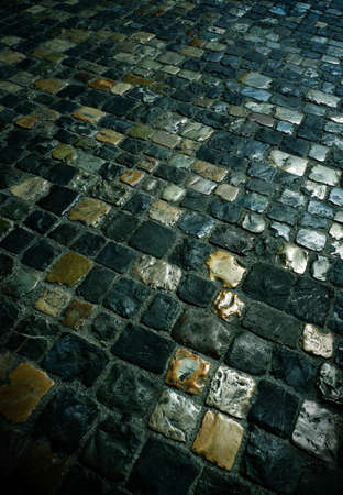 The roadway laid out by stones, street in a cityの写真素材