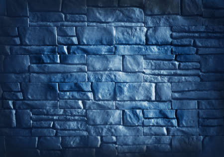 Old wall of bricks in night , a natural texture backgroundの写真素材