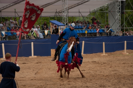 Moscow, Russia ? June 22, 2013: Times and Epoch-2013 festival in Kolomenskoye park. The Middle Ages (Srednevekove). Knight on a horse in a historical reconstruction on the joust.のeditorial素材