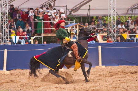 Moscow, Russia- June 22, 2013: Times and Epoch-2013 festival in Kolomenskoye park,. The Middle Ages (Srednevekove). Knight on a horse in a historical reconstruction on the joust.のeditorial素材