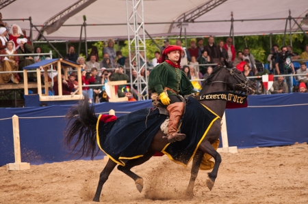 Moscow, Russia- June 22, 2013: Times and Epoch-2013 festival in Kolomenskoye park,. The Middle Ages (Srednevekove). Knight on a horse in a historical reconstruction on the joust.のeditorial素材