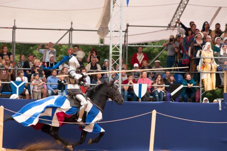 Moscow, Russia- June 23, 2013: Times and Epoch-2013 festival in Kolomenskoye park. The Middle Ages (Srednevekove). Knight on a horse in a historical reconstruction on the joust.のeditorial素材
