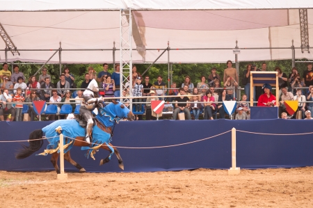 Moscow, Russia - June 23, 2013: Times and Epoch-2013 festival in Kolomenskoye park. The Middle Ages (Srednevekove). Knight on a horse in a historical reconstruction on the joust.のeditorial素材
