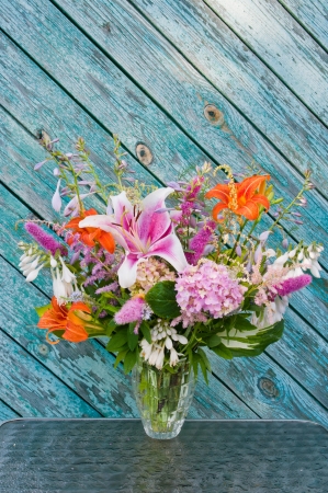 still life bouquet  lily, hosta, astilbe, hemerocallis and pink hydrangeaの写真素材