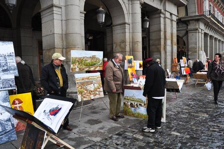 Madrid, Spain - March 23, 2010: Painting sellers in Madrid, square Mayor.のeditorial素材