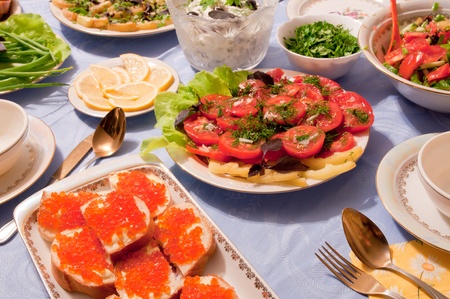 dishes of the food on the tableの写真素材