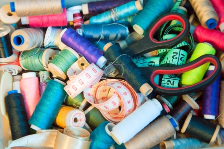 everything for sewing  bobbles of needles, scissors and tapes of measureの写真素材