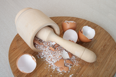 chapping eggs shell into powder of calciumの写真素材
