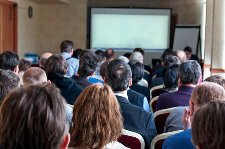 people sitting rear at the business conferenceの写真素材