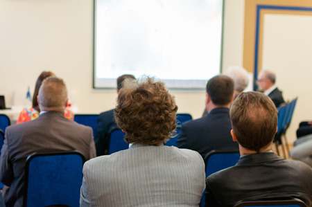 people sitting rear at the business conferenceの写真素材