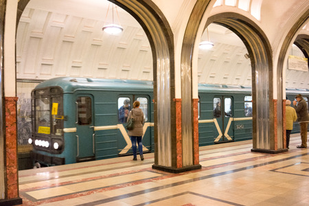 MOSCOW - 21 MARCH 2015: People in Mayakovskaya Metro Station in 21 March 2015. With a population of more than 11 million people is one the largest cities in the world and a popular destination.のeditorial素材