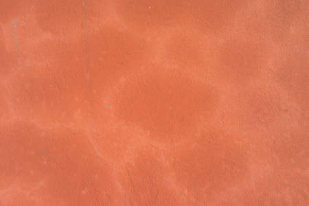 orange cement wall backgroundの写真素材